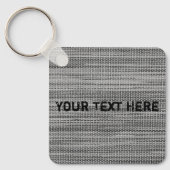 Imitate Schlüsselanhänger mit grauem Stoff mit ben (Vorderseite)