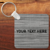 Imitate Schlüsselanhänger mit grauem Stoff mit ben (Vorderseite)