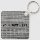 Imitate Schlüsselanhänger mit grauem Stoff mit ben (Rückseite)
