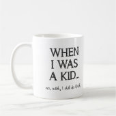 Immer noch ein Kind Lustiger Becher Kaffeetasse (Links)