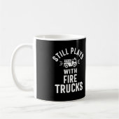 Immer noch mit Lastkraftwagen Kaffeetasse (Links)