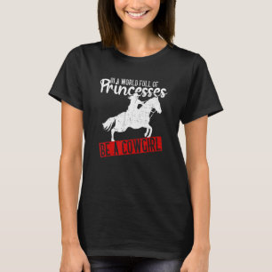 In einer Welt voller Prinzessinnen sei ein Cowgirl T-Shirt
