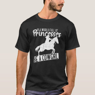 In einer Welt voller Prinzessinnen sei ein Cowgirl T-Shirt