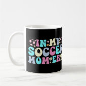 In meiner Fußball-Mama Kaffeetasse (Links)