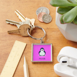 Individuelle Name niedlicher Pinguin auf rosa Schlüsselanhänger