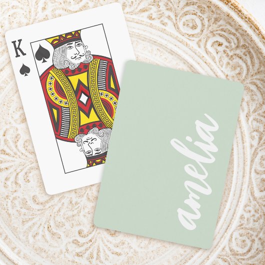 Individuelle Name-Skripte leuchten grün und weiß Spielkarten