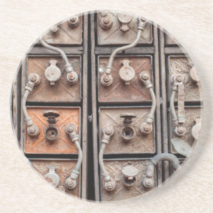 Industrielle Ausrüstung im stillgelegten Bergwerk Sandstein Untersetzer