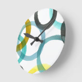 Ineinander greifen der gelben u. blauen Kreise Runde Wanduhr (Winkel)