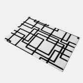 Ineinandergreifender schwarze fußmatte (Schrägansicht)