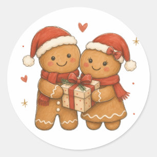 Ingwerbrot-Paar mit Geschenk und Weihnachtsmannmüt Runder Aufkleber