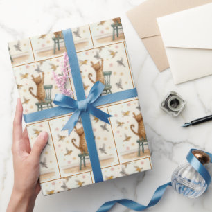 Ingwerkatze, die einen Vogel auf Papier fängt Geschenkpapier