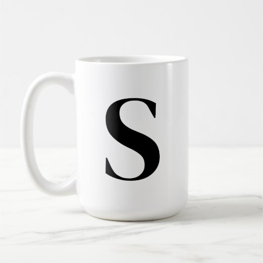 Initial für Personalisiertes Monogramm eines benut Kaffeetasse (Links)
