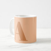 Initialbrief der Peach Monogram Kaffeetasse (Vorderseite Links)
