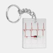 Injektion mit rotem Herzen Schlüsselanhänger (Vorderseite links)