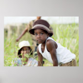 Injured child in the grass. poster (Vorne)