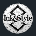 Ink&Style Dartscheibe<br><div class="desc">¡Sé el primero en tenerlo! Presentamos la primera obra oficial de Ink&Style: un diseño único que combina elegancia, trazos artísticos y geometría con carácter. Esta pieza es más que un logo: es una declaración de estilo, creatividad e identidad visual. Ideal para cuadros decorativos, rompecabezas, bolsos, posters o cualquier objeto con...</div>