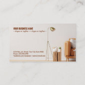 Innenwand des Wohnzimmers in warmen Farbtönen mit Visitenkarte (Rückseite)