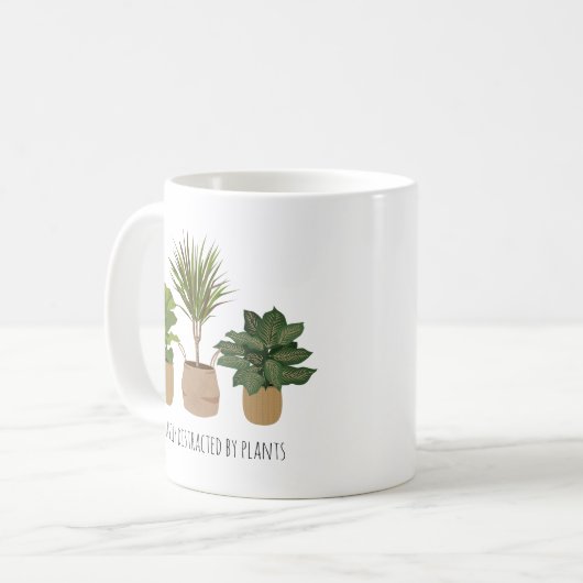 Innere Pflanze leicht von Pflanze abgelenkt Kaffeetasse (Vorderseite Links)