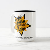 .insatiable. Spiel 15 Unze. Tasse (Vorderseite Links)