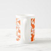 INSELPLUMERIA (SEHR ORANGE) PORZELLANTASSE (Rückseite)