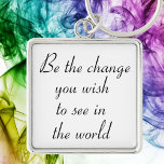 Inspiration Schlüsselanhänger motivierend Schlüsse<br><div class="desc">Inspirative Schlüsselanhänger motivierend Schlüsselanhänger Geschenk. Sei die Veränderung,  die du in der Welt sehen willst. Schwarzweiß-Schlüsselanhänger mit einem Zitat von Gandhi. Würde eine großartige,  anpassbare Geschenkidee machen.</div>