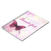 inspirierendes Zitat mit einem Schmetterling in Aq Notizblock (Linke Seite)