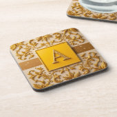 Intricentive Letter A Design mit goldenen Grenzen Getränkeuntersetzer (Linke Seite)