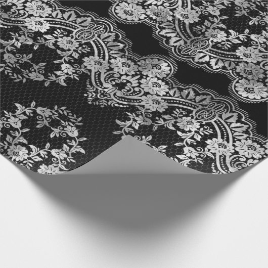 Intrictive weiße Spitzen auf Schwarz Geschenkpapier (Ecke)