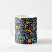 Intrigante Blumenkunst: Blaue und orangefarbene Bl Kaffeetasse (Vorderseite Links)