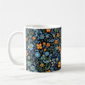 Intrigante Blumenkunst: Blaue und orangefarbene Bl Kaffeetasse (Links)