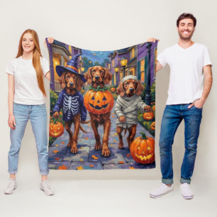 Irischer Rotsetter beim Trick-or-Treaten Halloween Fleecedecke