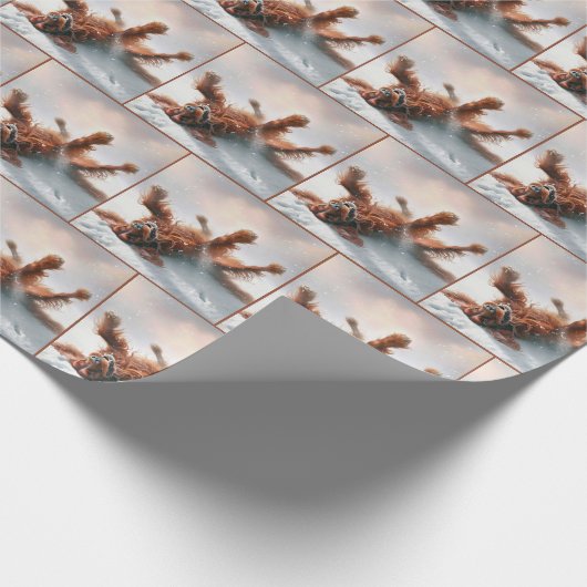 Irischer Setter hat Spaß im Schnee Geschenkpapier (Ecke)