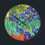 Irises von Vincent Van Gogh Runde Wanduhr<br><div class="desc">Vincent Van Gogh Irises 1889 gemalt ist es eines der Gemälde,  die er in Saint Paul-de-Mausole Asyl in Saint-Rémy-de-Provence in Frankreich erschuf. Es ist ein Ölgemälde. Diese kunstvolle Ölmalerei zeigt ein Feld von Iris-Blume-Pflanze.  Vincent Van Gogh war ein berühmter Künstler. Er war ein niederländischer Postimpressionist.
Dieses Gemälde ist öffentlich.</div>