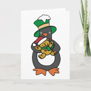 Irish Penguin hält Weihnachts-Teddybär Karte