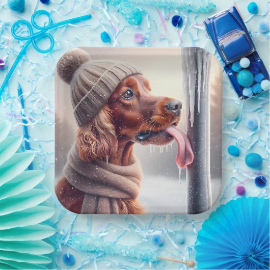 Irish Setter Hund leckt einen gefrorenen Pole Pappteller (Party)