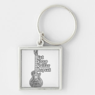 Iss schlafgitarre wiederholen. Vintag schwarz-weiß Schlüsselanhänger