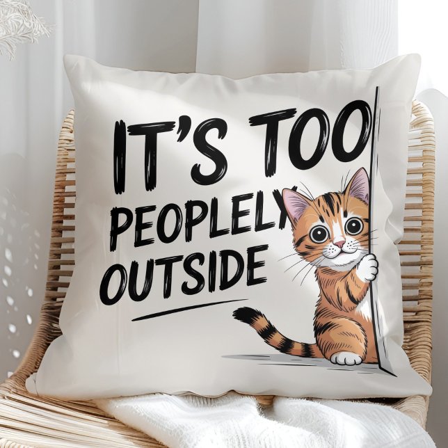 "It's Too Peopely Outside" Funny Introvert Cat Kissen ("It's Too Peopely Outside" Funny Introvert Cat Throw Pillow in a sunny boho rattan chair.)
