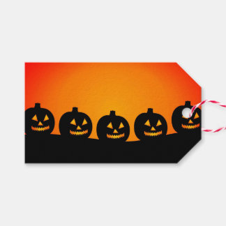 Jack o' Lanterns in einem Row-Geschenketikett Geschenkanhänger