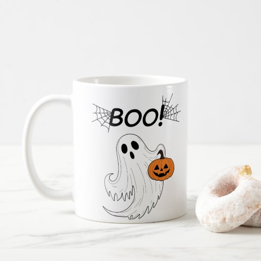 Jack-o’-Laterne und ein weißes Ghost-Boom Hallowee Kaffeetasse (Mit Donut)
