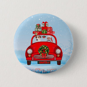 Jack Russell Hund im Auto mit dem Weihnachtsmann Button