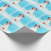 Jack Russell Hund im Schnee sitzen mit Weihnachtsm Geschenkpapier (Ecke)