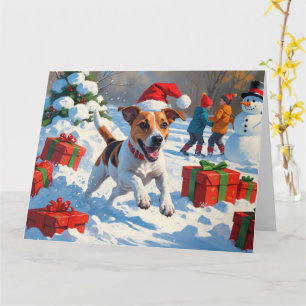 Jack Russell läuft in Snow mit Weihnachtsmütze Karte