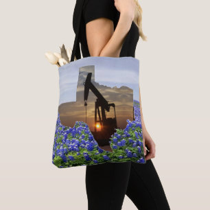 Jack von Texas-Ölpumpen in Bluebonnets Tasche