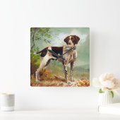 Jägerhund mit Vogel im Mund Quadratische Wanduhr (Zuhause)