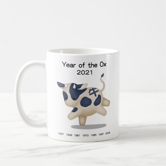 Jahr des Ox-Niedlichen Tieres 2021 Kaffeetasse (Links)