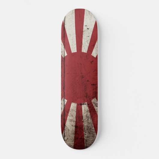 Japan-aufgehende Sonne-Flagge auf altem hölzernem Skateboard (Vorderseite)