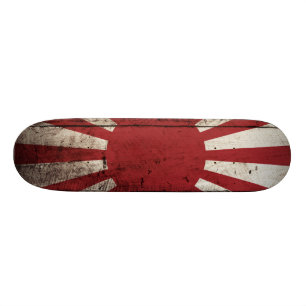 Japan-aufgehende Sonne-Flagge auf altem hölzernem Skateboard