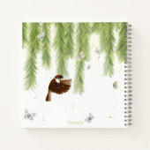 Japanische Baumspreizen unter einem schleichenden  Notizblock (Rückseite)