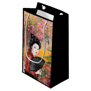 Japanische Szene mit einem kleinen weiblichen Gesc Kleine Geschenktüte