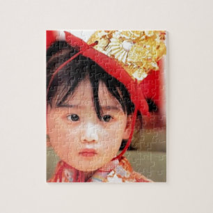 Japanisches kleines Mädchen, das einen Kimono träg Puzzle